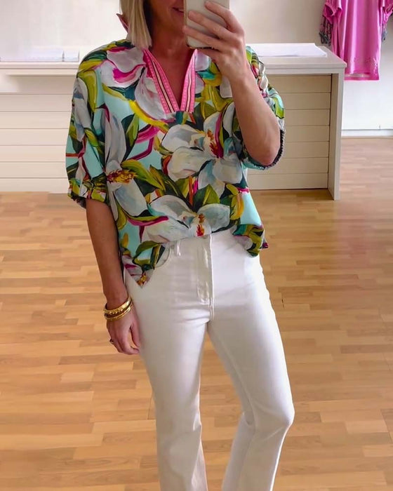 Blommönster med ställkrage med halvärm