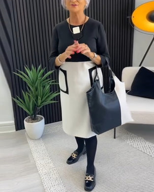 Casual kontrastfärgad fickklänning med rund hals