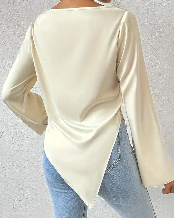Casual enfärgad oregelbunden blus med veck och lång ärm
