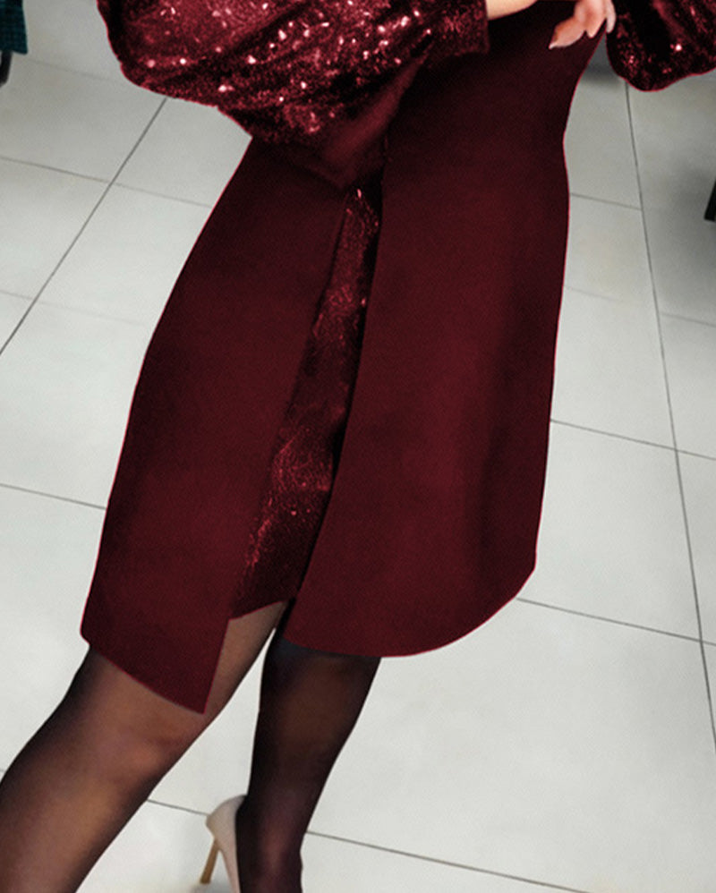 Elegant Klänning Med Puffärmar Och Lapptäcktsdetaljer