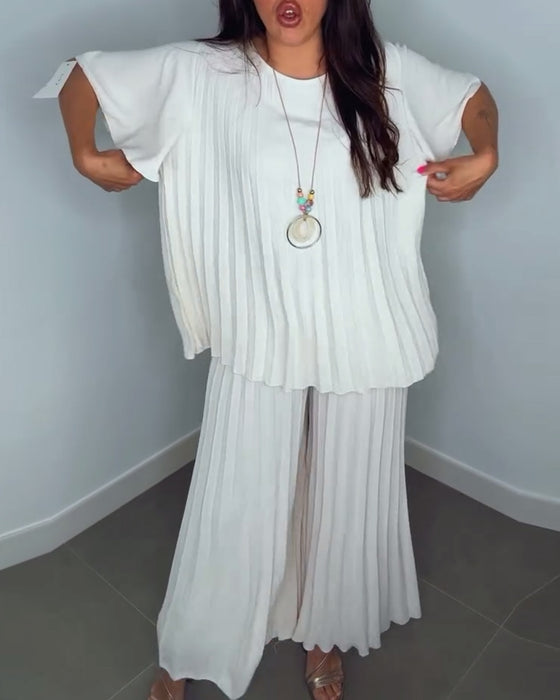 Enfärgade plisserade lösa set