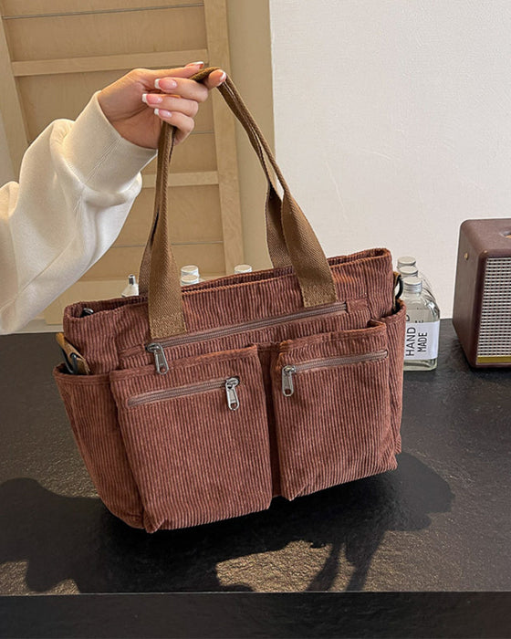 Enfärgad manchesterväska