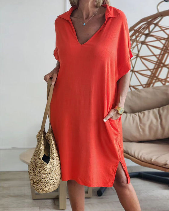 Enfärgad lapelklänning med fickor