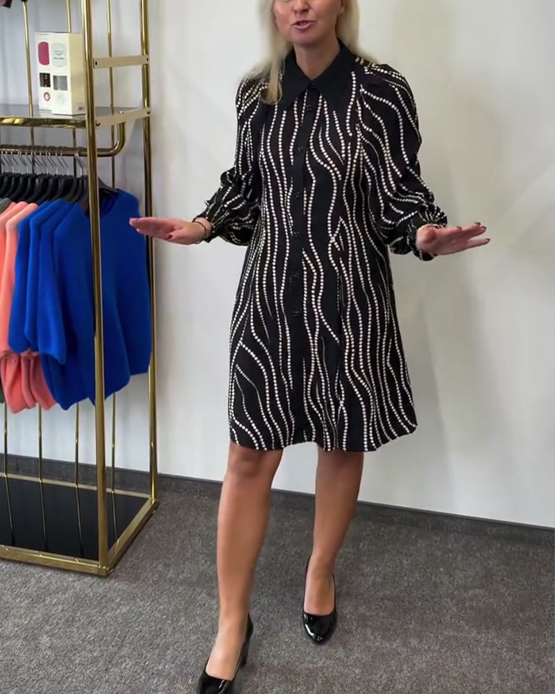 Klänning Slagkrage Vågmönster Kedjedetalj