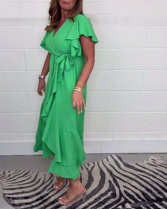 Volang elegant klänning i enfärgad slits