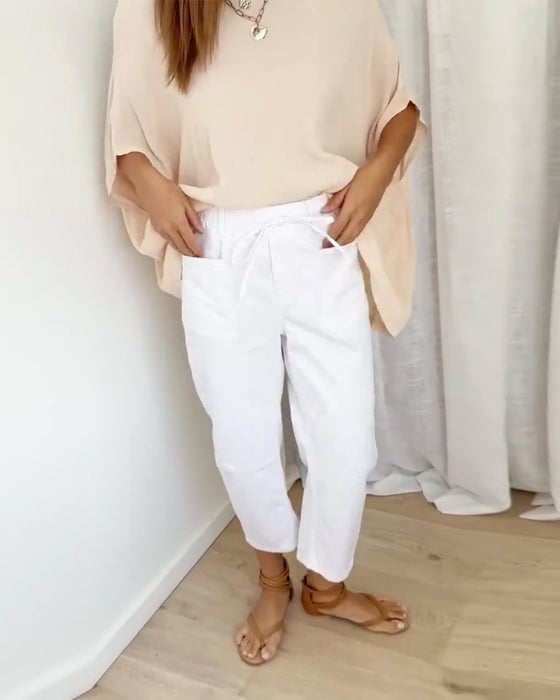 Byxor I Denim Med Fickor Och Kort Längd