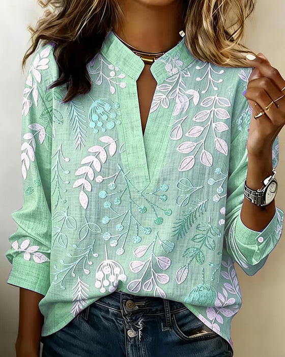 Blus Med Blommigt Mönster Och Ståkrage