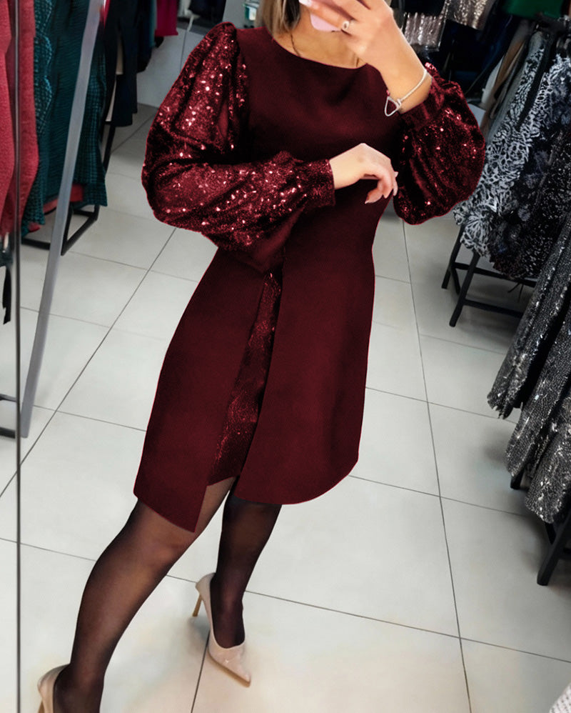 Elegant Klänning Med Puffärmar Och Lapptäcktsdetaljer