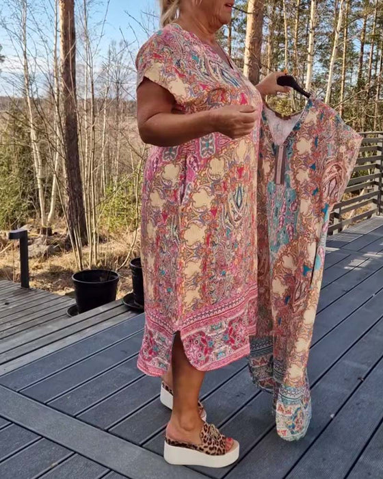 Klänning V-Ringad Kortärmad Mönstrad Rak