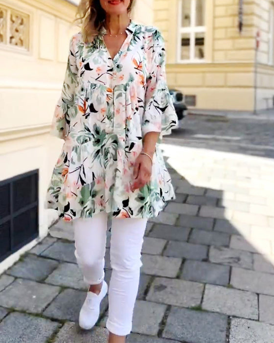V-ringad blommig elegant blus