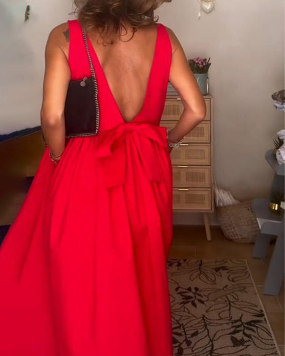 Rygglös Klänning Med Bow