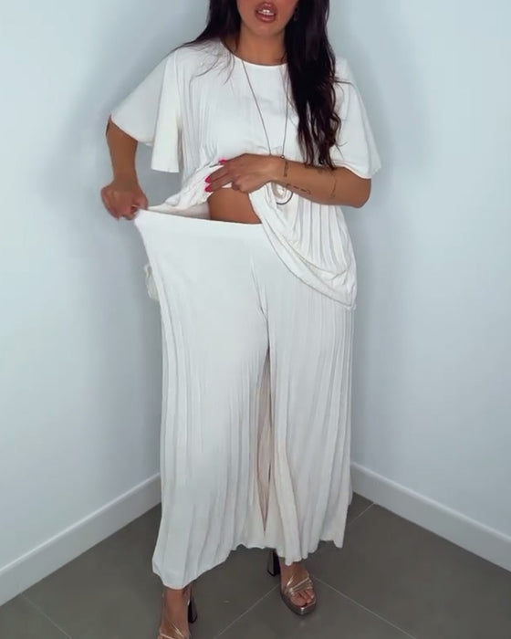 Enfärgade plisserade lösa set