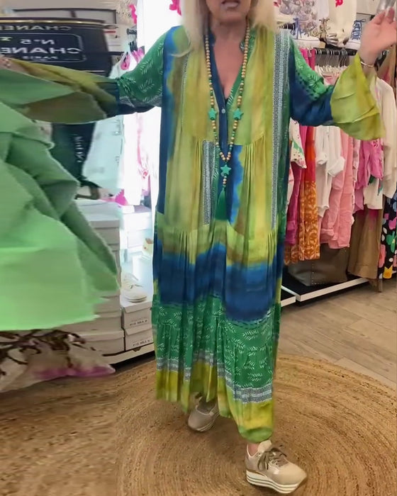 Tryckt avslappnad V-ringad lång klänning med utsvängda ärmar