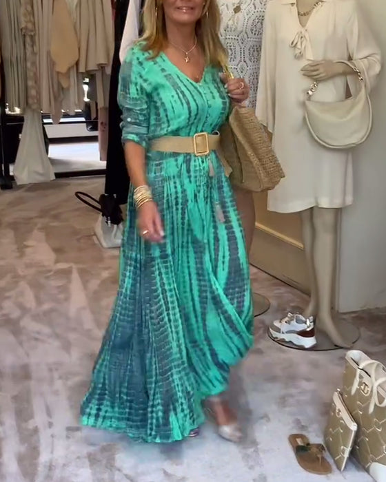 Tryckt V-ringad maxiklänning med knappar