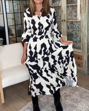 Tryckt långärmad avslappnad maxiklänning