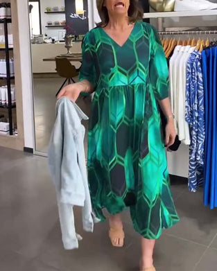 Trekvartsärm med V-ringad klänning