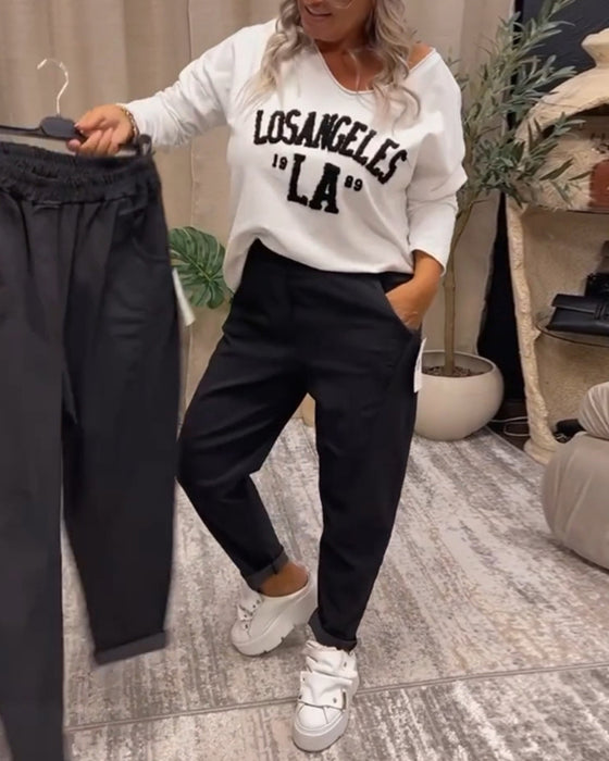 V-ringad casual sweatshirt med bokstavstryck