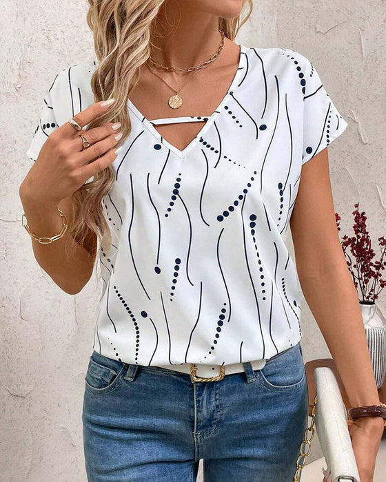 T-Shirt V-ringning Kortärmad Tryckt