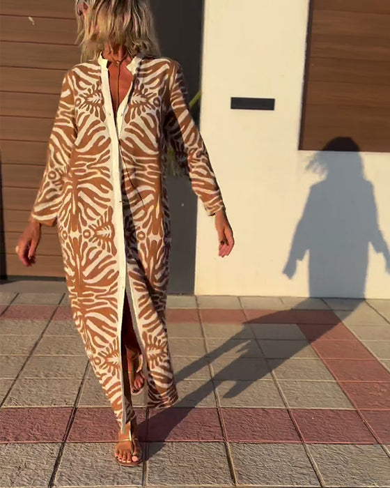 Långärmad klänning med tryckt tryck