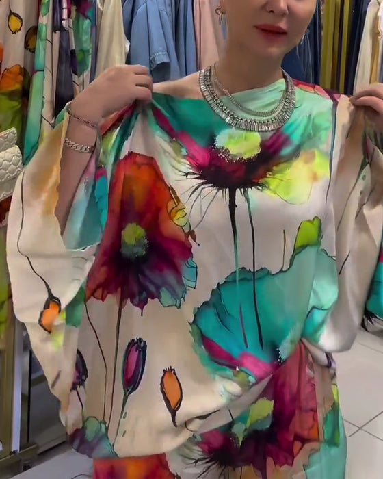 Lotustryckset med en axel och trekvartsärm