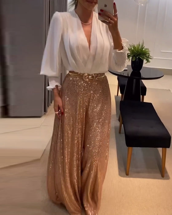 Elegant enfärgad blus med V-ringad lyktaärm