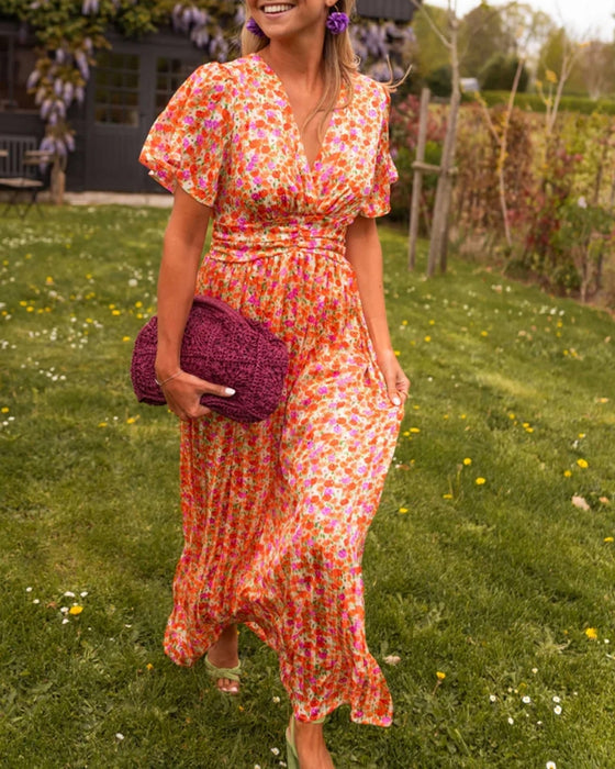 V-ringad blommig klänning i midjan