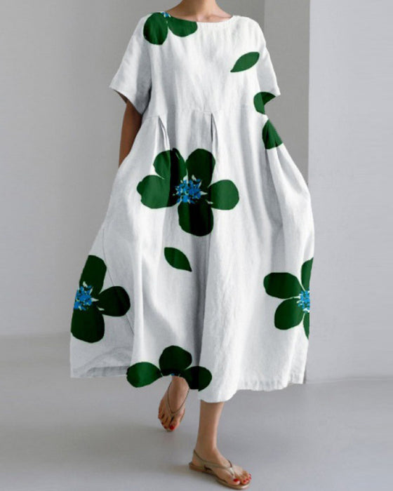 Lös kortärmad klänning med tryck