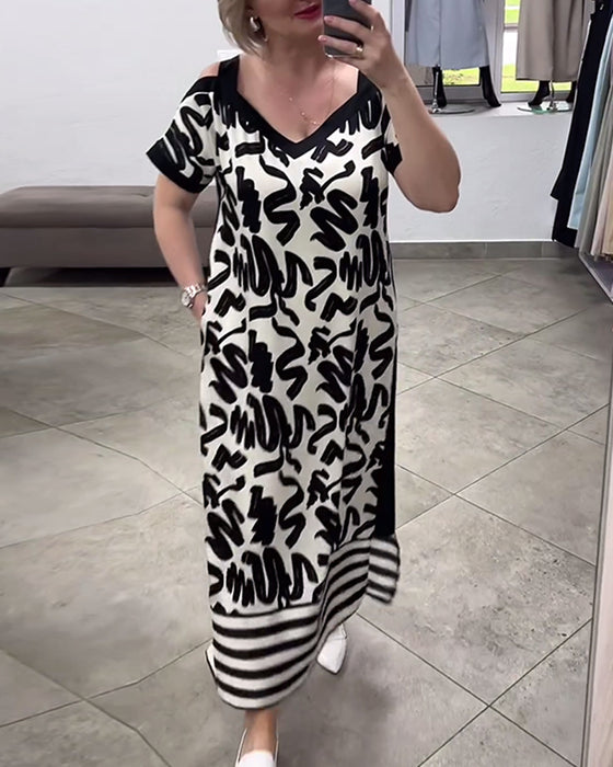 Kortärmad off-the-shoulder klänning med tryck