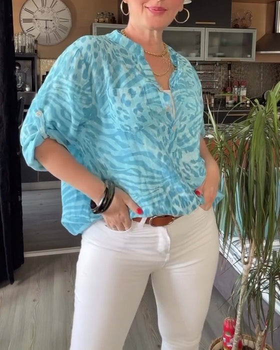 Tryckt blus med V-ringad ficka med trekvartsärm och knapp