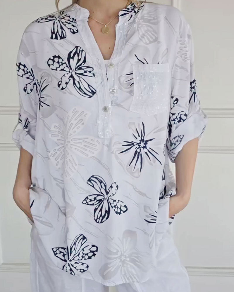 Blus Blomsterknappning V-hals