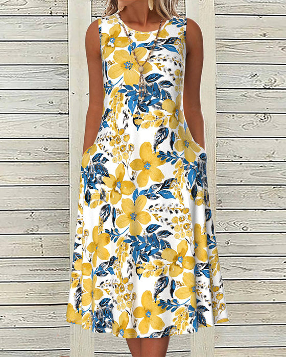 Ärmlös klänning med blommönster och ficka