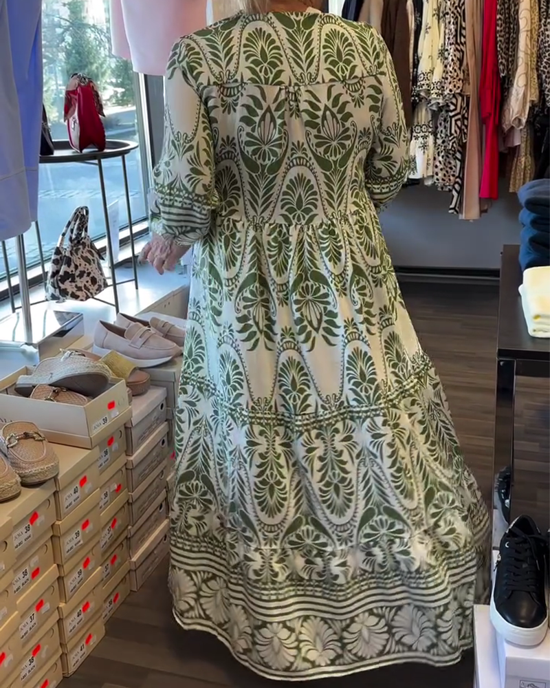 Klänning Med Blommönster Och V-Ringning