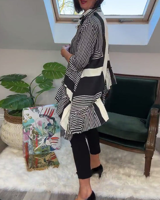 Modetryckt oregelbunden lapptröja med knappar