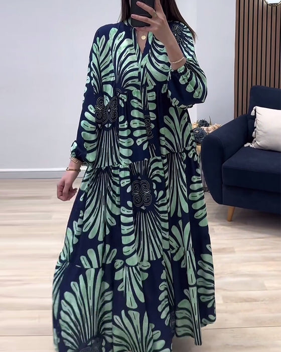 Ståkragetryckt lång klänning med lång ärm och patchwork