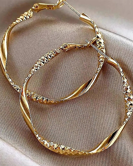 Minimalistisk Oregelbunden Vriden Ring Örhängen Elegant Texturerad Design