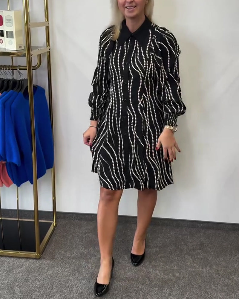 Klänning Slagkrage Vågmönster Kedjedetalj