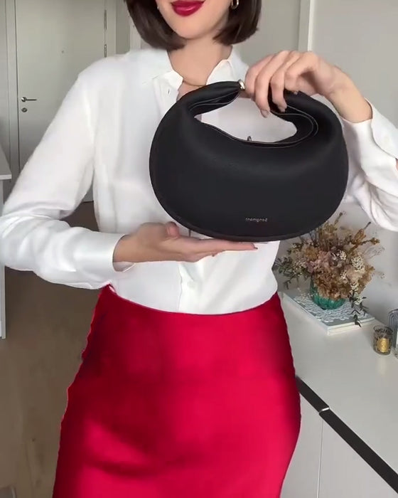 Enfärgad elegant halvmåneformad axelremsväska