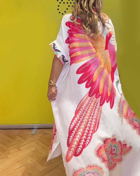 Lång tryckt klänning med slag