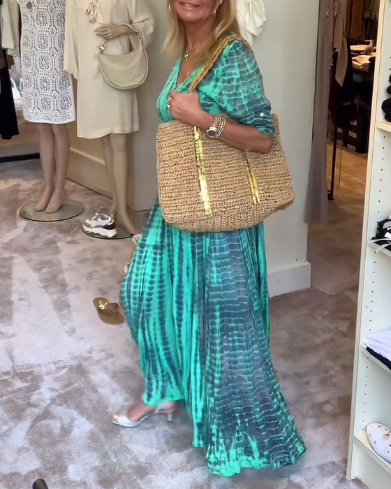 Tryckt V-ringad maxiklänning med knappar