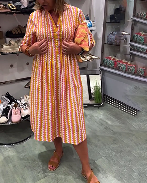 Klänning med vågmönster