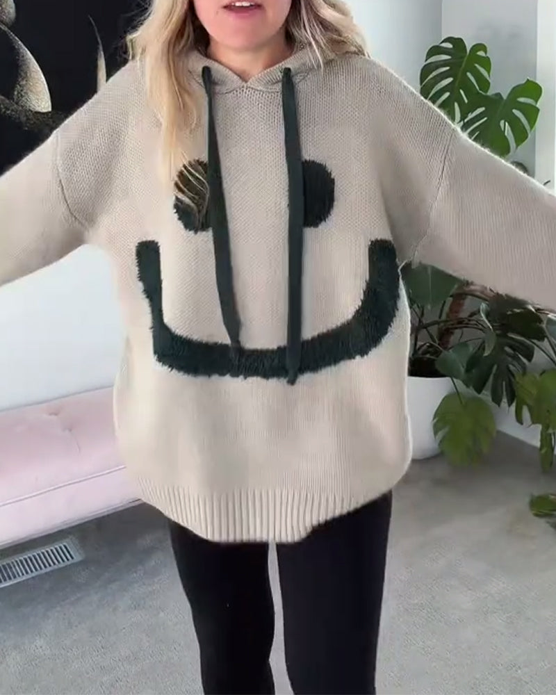 Tröja med smiley-motiv och lös luva