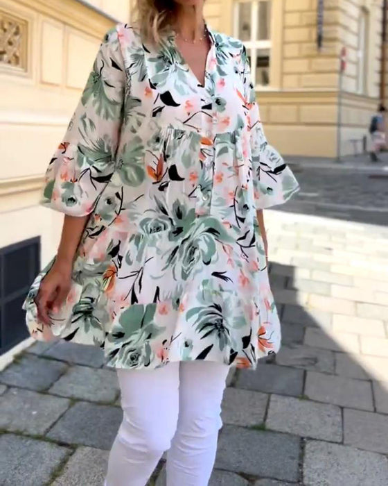 V-ringad blommig elegant blus