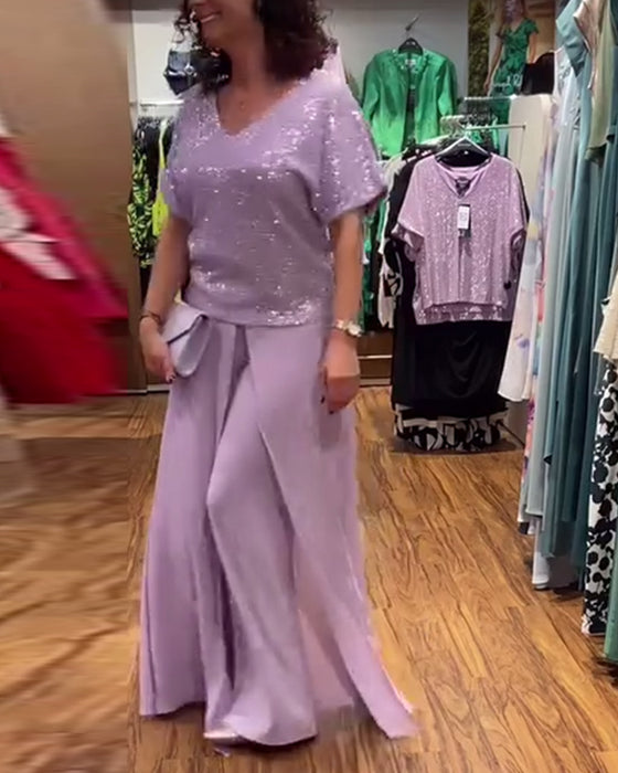 V-ringad kortärmad blus med lös paljett