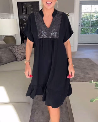 V-ringad lös veckad klänning