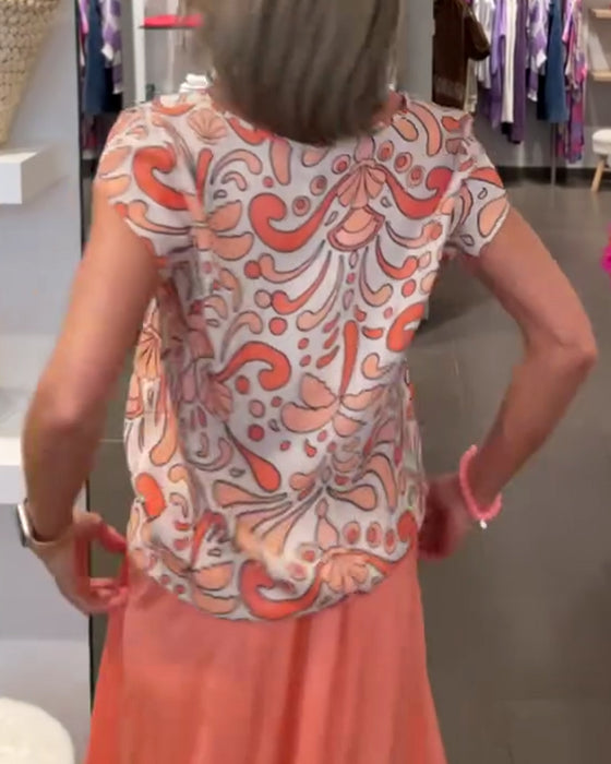 Printad ledig blus med V-ringning och raglanärmar