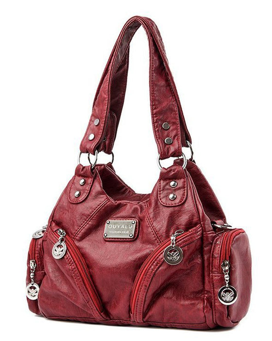 Vintage mjuk läderhandväska och budbärarväska.