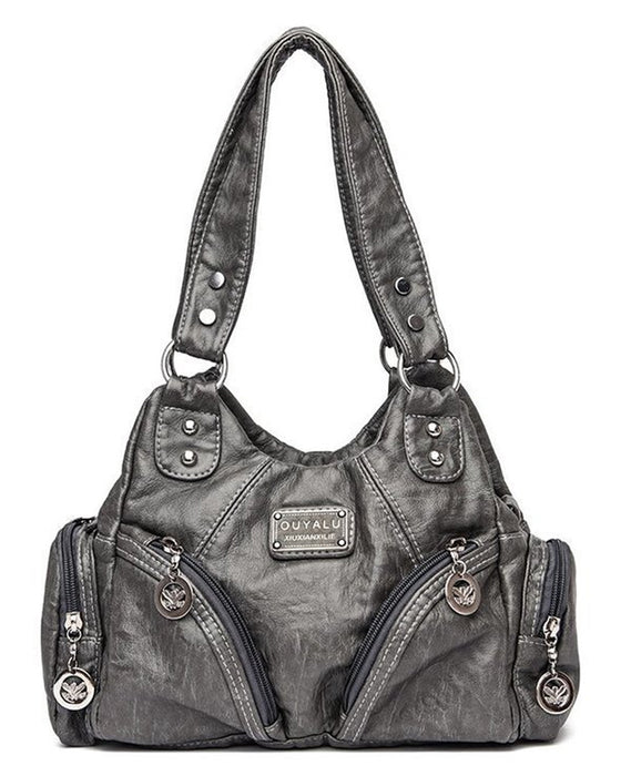 Vintage mjuk läderhandväska och budbärarväska.