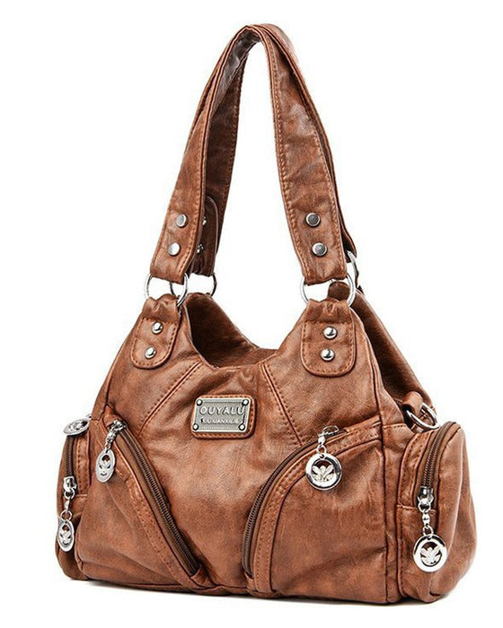 Vintage mjuk läderhandväska och budbärarväska.