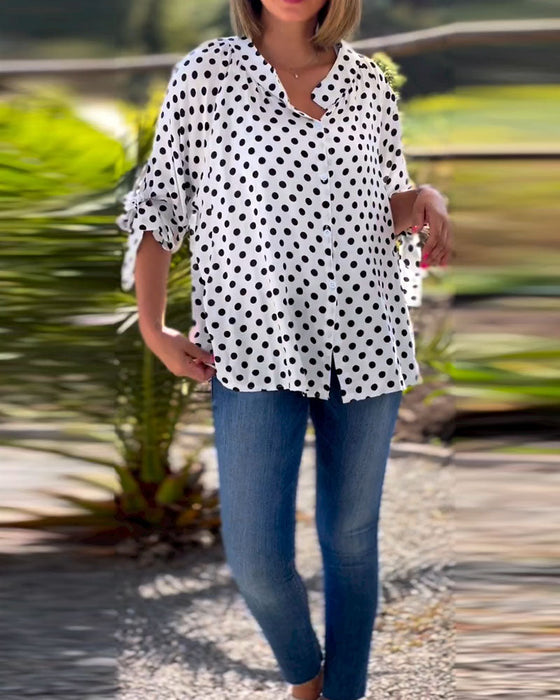 Blus med prickigt tryck och halvärm