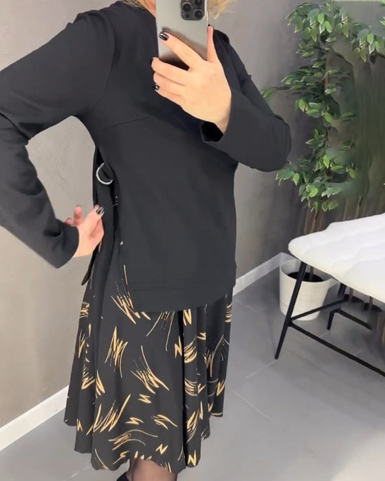 Avslappnad klänning med lös passform och rund hals